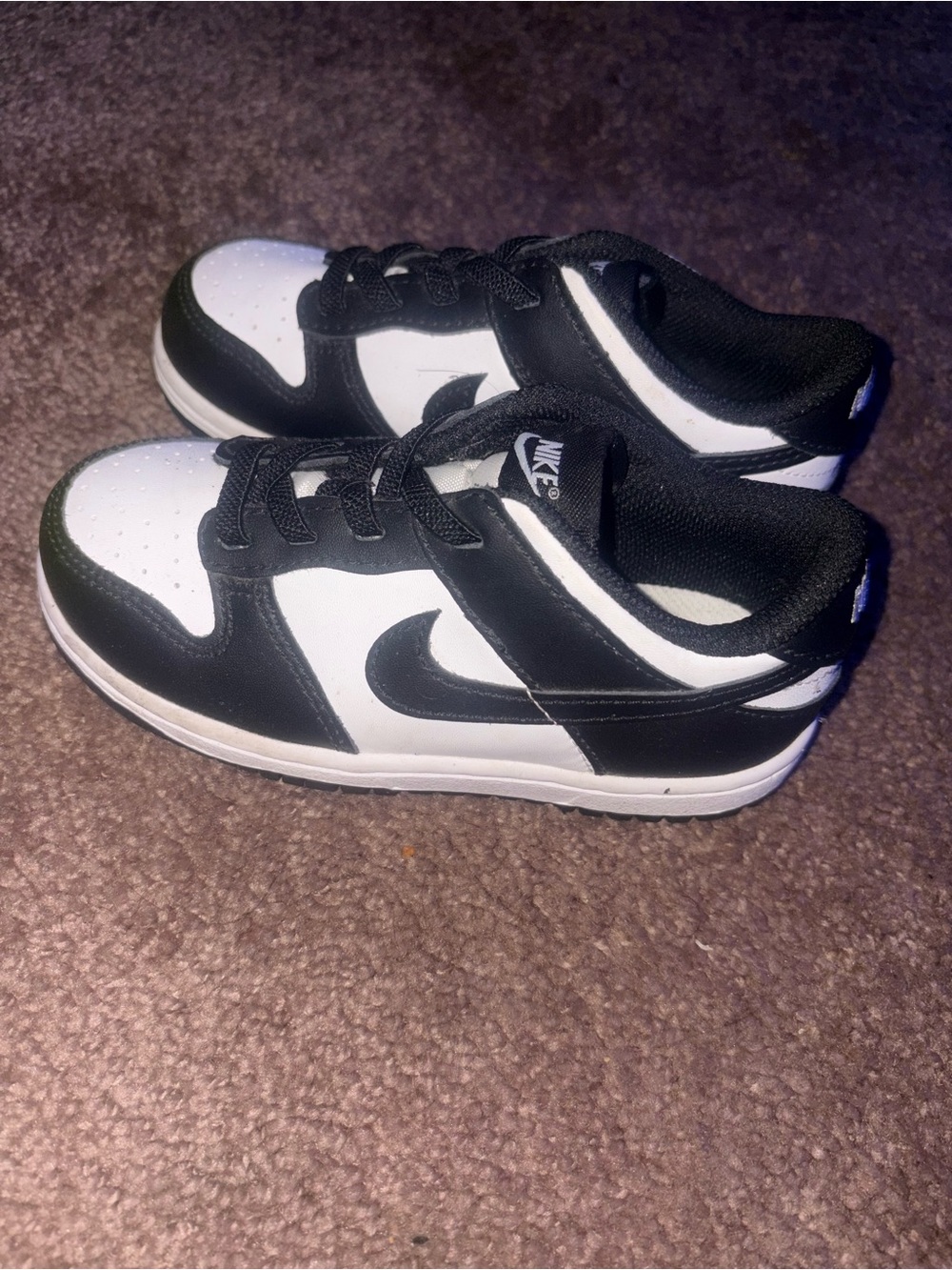 Kids Nike Black and White Low-Top Sneakers with Swoosh